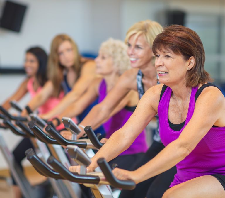 How Menopausal Women Can Lose Fat And Gain Muscle stationary bike